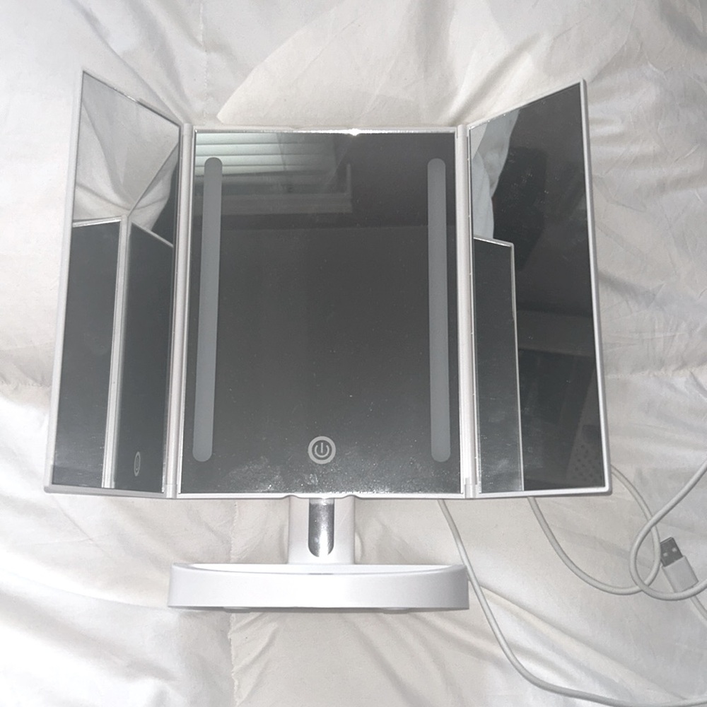 Makeup mirror with lights